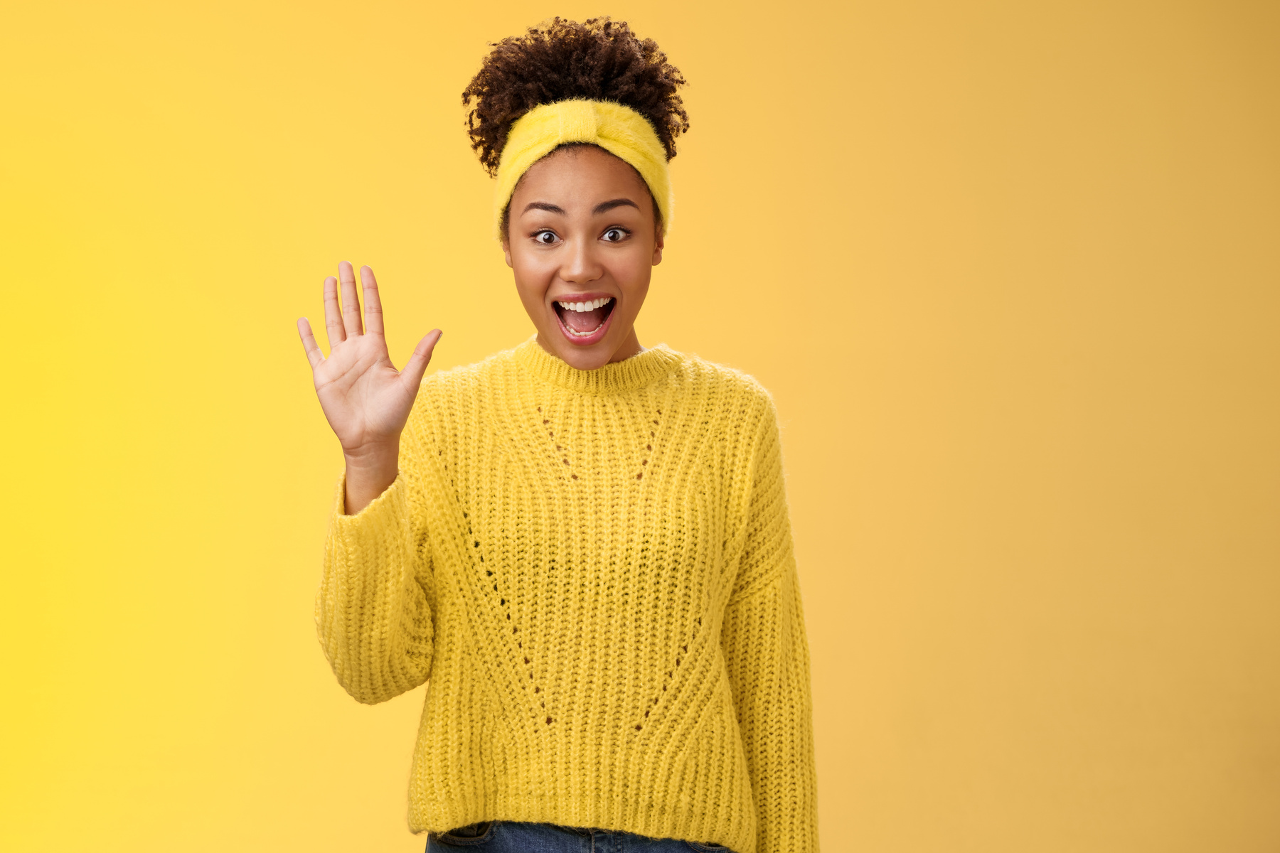 Friendly Outgoing Excited Cute Millennial Female Coworker Newbie Greeting Team Waving Palm Hi Hello Gesture Energized Get Know New People Welcoming Greeting Friends, Standing Yellow Background